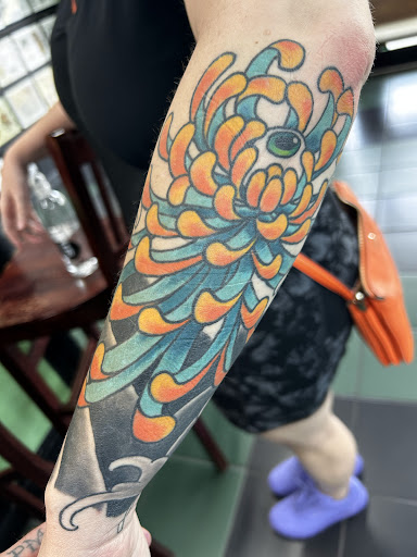 Explore 2 percent tattoo ideas, creative tattoo ideas in Ormond Beach, available at Shamrock Tattoo