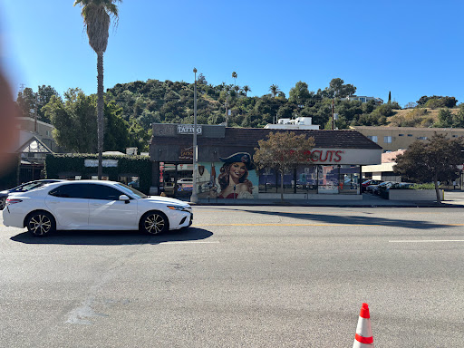 Explore broken heart tattoo ideas for guys, creative tattoo ideas in Studio City, available at Studio City Tattoo