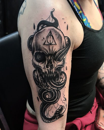 Explore 90's cartoon tattoo ideas, creative tattoo ideas in Bronx, available at Tattoo Society Studio