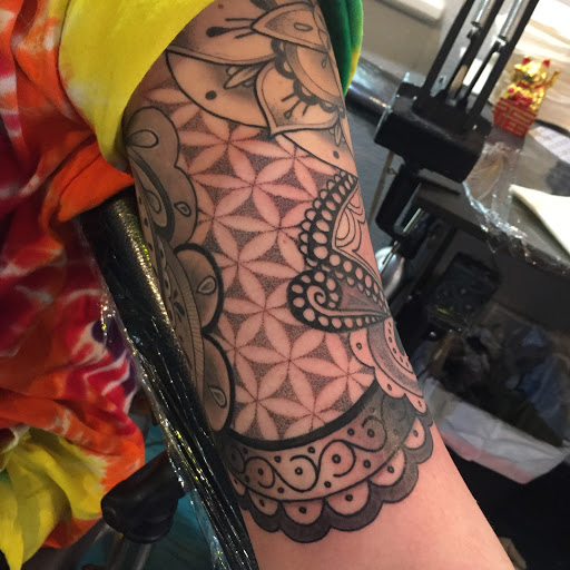 Explore shaka tattoo ideas, creative tattoo ideas in Reno, available at Aces Tattoo