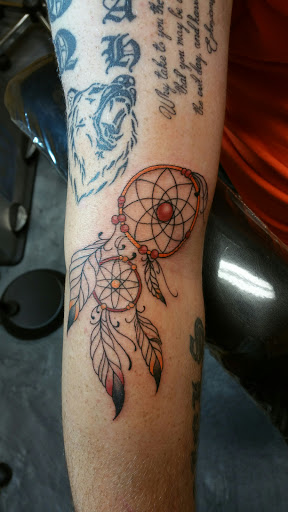 Explore hello kitty tattoo ideas, creative tattoo ideas in Foley, available at Black Sheep Custom Tattoos and Piercings