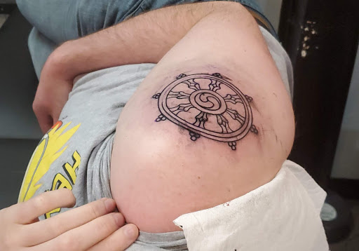 Explore cover up tattoo ideas male arm, creative tattoo ideas in Albany, available at DieHard Piercing & Tattoo Studio