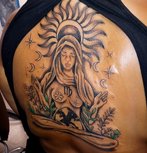 Explore tattoo ideas for a name cover up, creative tattoo ideas in Richmond, available at Art Period llc Tattoos and Artwork by Leigh Odom