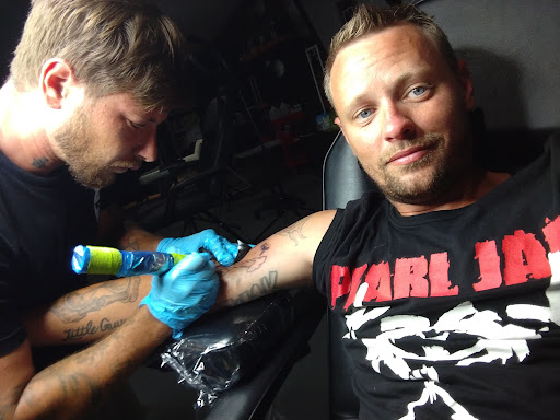 Explore mass effect tattoo ideas, creative tattoo ideas in Titusville, available at Space Coast Ink Tattoo Studio