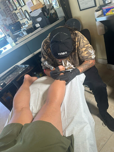 Explore toy story tattoo ideas, creative tattoo ideas in Venice, available at Ink Monkey Tattoo and Piercing