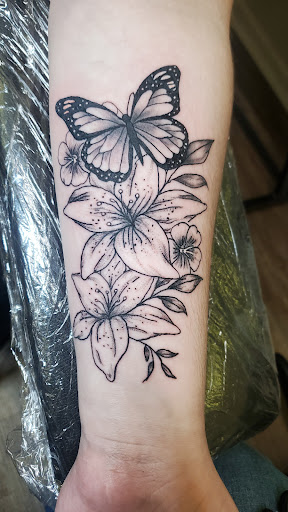 Explore flower tattoo cover up ideas, creative tattoo ideas in Vidalia, available at Fascination Ink LLC