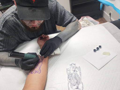 Explore cover up star tattoo ideas, creative tattoo ideas in Los Angeles, available at Hydra Tattoo Studio