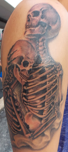 Explore small dog tattoos ideas, creative tattoo ideas in Saint Louis, available at Steel and Ink Tattoo Studio