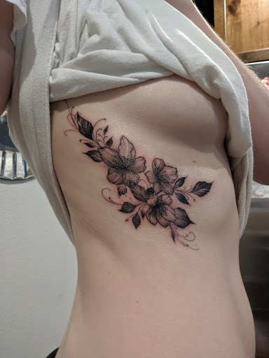 Explore peony tattoo ideas, creative tattoo ideas in Abilene, available at La Leyenda Tattoo Co