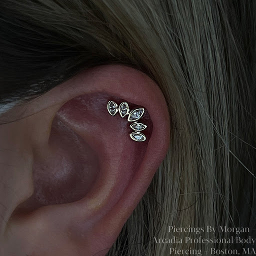 Explore wind tattoo ideas, creative tattoo ideas in Boston, available at Arcadia Body Piercing