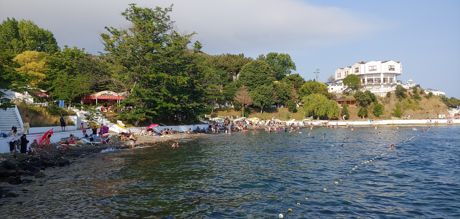 Foto van Siniop Ada Otel Plaji deels hotelgebied