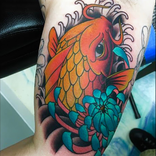 Explore neck and shoulder tattoo ideas, creative tattoo ideas in Galveston, available at Von Striga Art Parlor