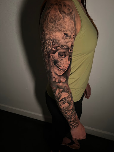 Explore traditional hand tattoo ideas, creative tattoo ideas in Riverview, available at 9-Line Tattoo