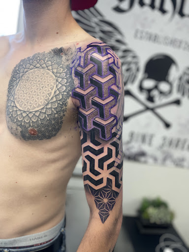 Explore aztec chest tattoo ideas, creative tattoo ideas in Great Falls, available at Alpha Tattoos & Piercings