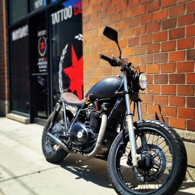 Explore iris flower tattoo ideas, creative tattoo ideas in Chicago, available at Mayday Tattoo Co