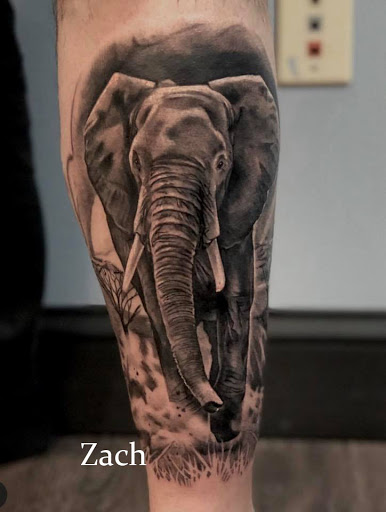 Explore elbow tattoo ideas for guys, creative tattoo ideas in Sanford, available at Venom Ink Tattoo