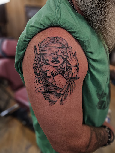 Find small tree tattoo ideas for your next unique tattoo in Sevierville at Jaded Art Collective