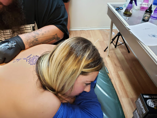 Explore tattoo ideas for photographers, creative tattoo ideas in Owensboro, available at BnB Tattoos & Piercings