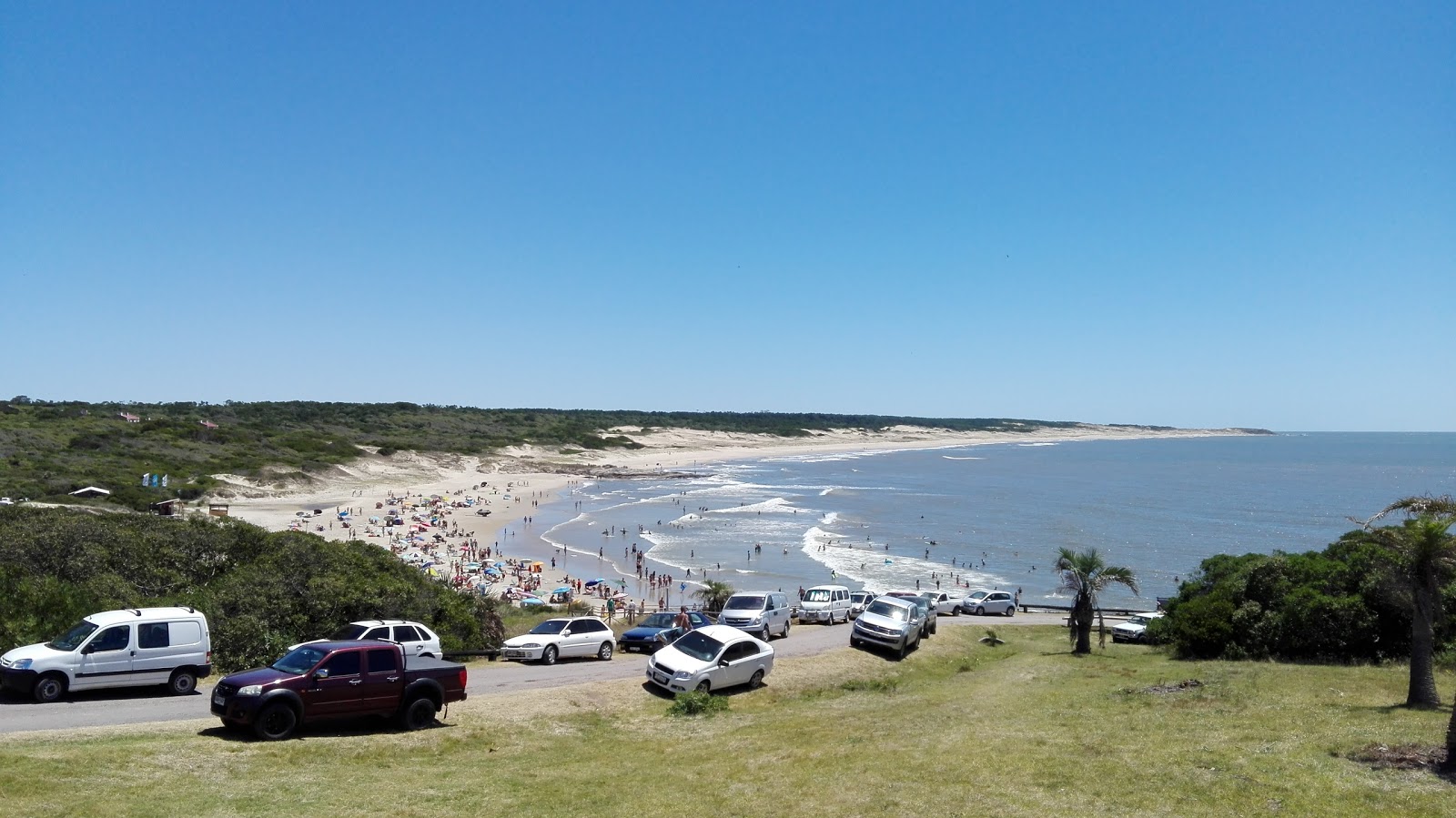 Zdjęcie Del Barco Beach z powierzchnią beżowy piasek