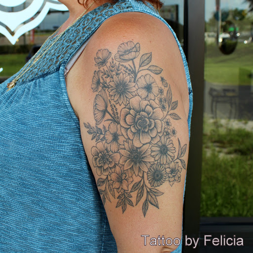 Explore side boob tattoo ideas, creative tattoo ideas in Fort Myers, available at Tiger Lotus Tattoo and Piercing