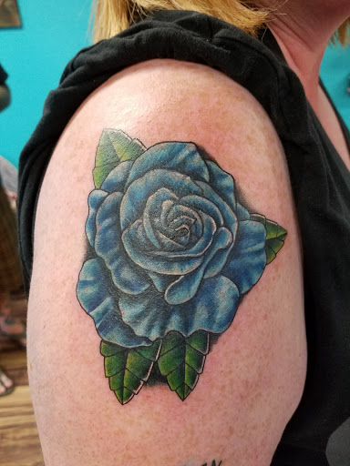 Find underboob tattoo idea for your next unique tattoo in Ocala at The Tattoo Gallery of Ocala LLC