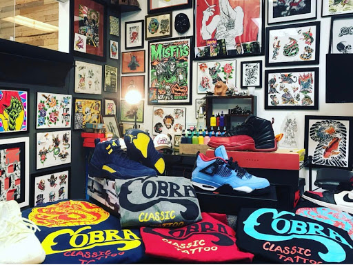 Explore flag tattoo ideas, creative tattoo ideas in Ocala, available at Cobra Classic Tattoo