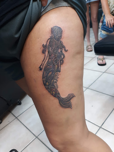 Explore watercolor flower tattoo ideas, creative tattoo ideas in Bradenton, available at Memory Lane Tattoo Co.