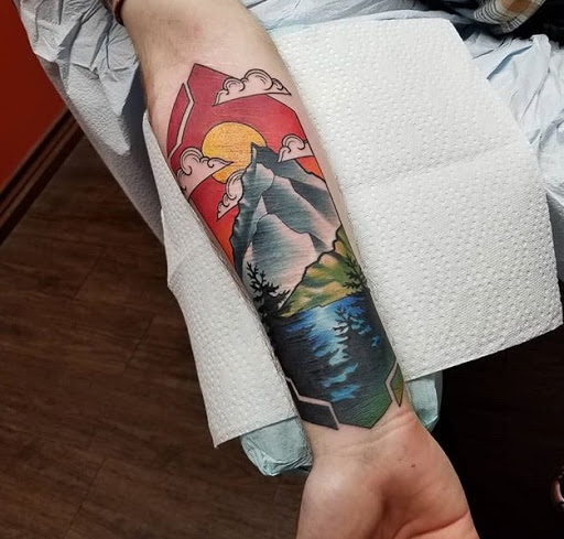 Explore flower tattoo cover up ideas, creative tattoo ideas in Arlington, available at Depiction Tattoo Gallery