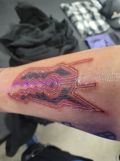 Explore mom tattoo ideas for guys, creative tattoo ideas in Buford, available at Wild Tribe Tattoos and Piercings