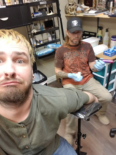 Explore ankle tattoo ideas for men, creative tattoo ideas in Mineola, available at Kiss of Death Ink