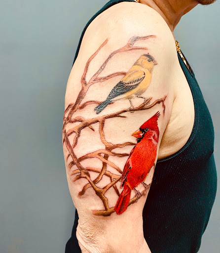 Explore love death and robots tattoo ideas, creative tattoo ideas in Lakeland, available at Lyons Den Tattoo Company