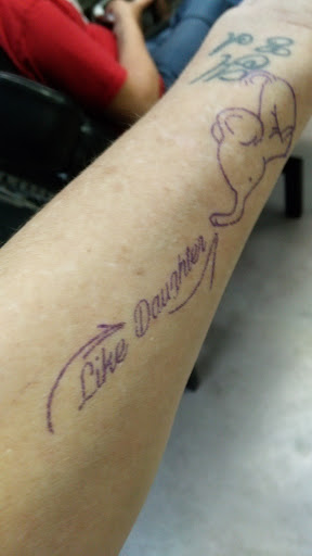 Explore guns n roses tattoo ideas, creative tattoo ideas in Anniston, available at Wicked Game Tattoo & Piercing Studio