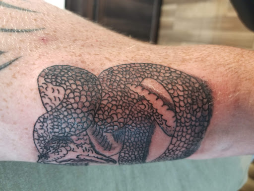 Explore shoulder tattoo idea, creative tattoo ideas in Arcade, available at 98 South Tattoo and Piercing