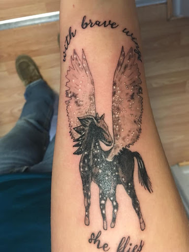 Explore side stomach tattoo ideas, creative tattoo ideas in Jonesboro, available at Immortal Ink