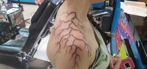 Explore leg tattoo ideas woman, creative tattoo ideas in Walla Walla, available at Tatmandu