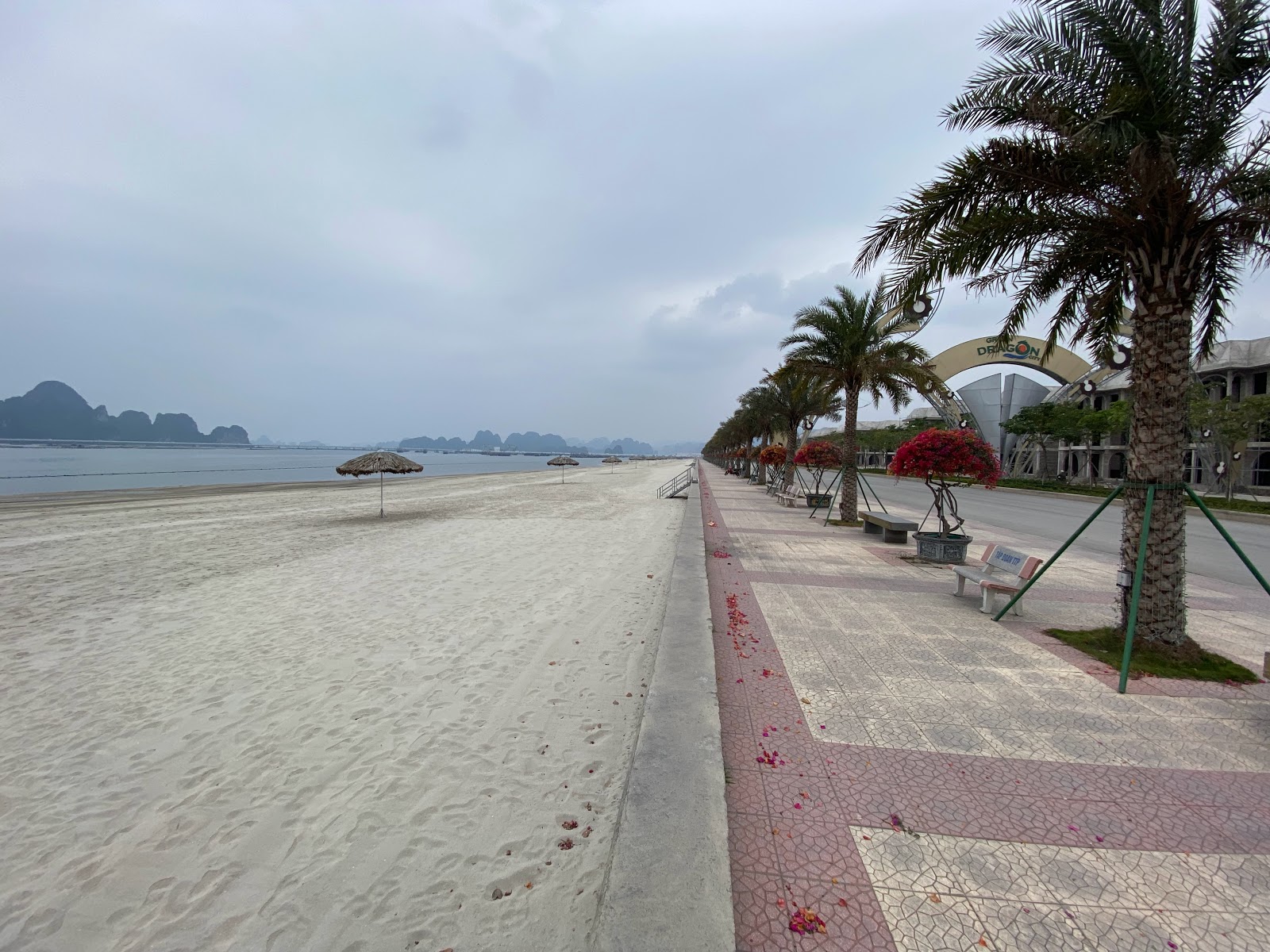 Photo of Green Dragon beach with turquoise pure water surface