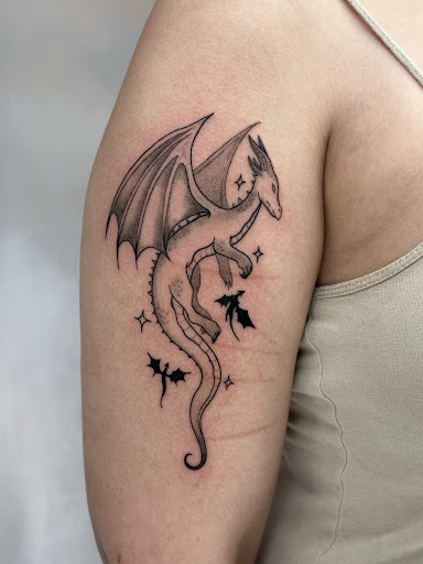 Explore fire sign tattoo ideas, creative tattoo ideas in Marietta, available at The Queen Bee Tattoo and Piercing Parlour