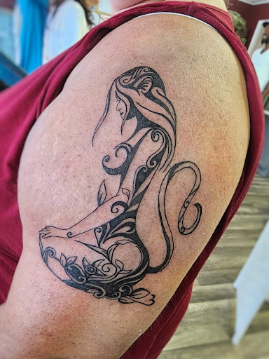 Find angels tattoos ideas for your next unique tattoo in Minocqua at Walking Arts Tattoos