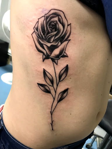 Explore small tattoo ideas for men's arms, creative tattoo ideas in Muncie, available at The Tattoo Studio