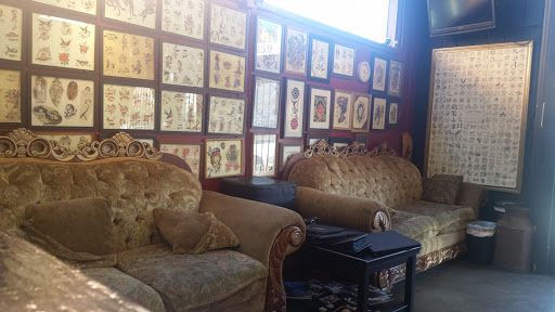 Explore back leg tattoo ideas, creative tattoo ideas in Fresno, available at Resistance Tattoo