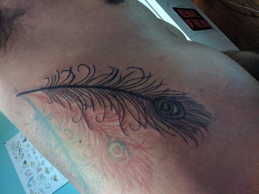 Explore soundwave tattoo ideas, creative tattoo ideas in Phenix City, available at South Railroad Ink