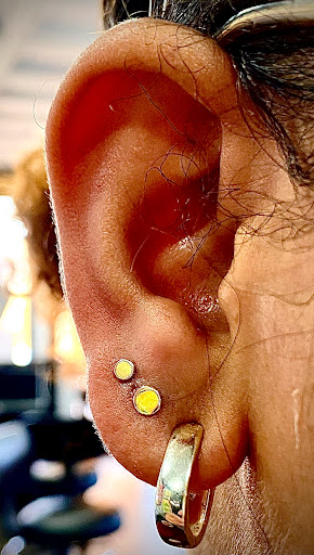 Explore ffx tattoo ideas, creative tattoo ideas in Orange, available at Symbiosis Body Piercing