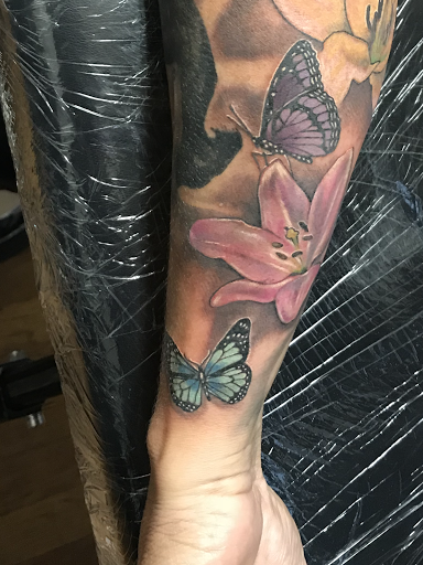 Explore guy back tattoo ideas, creative tattoo ideas in Silver City, available at Independent Ink Tattoo