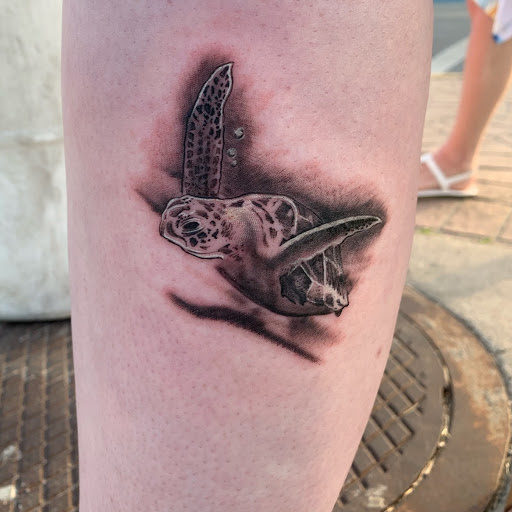 Tattoo Shop «magnum opus tattoo company», reviews and photos, 1817 Padre Blvd #4, South Padre Island, TX 78597, USA