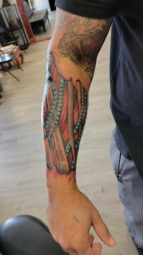 Explore thigh/butt tattoo ideas, creative tattoo ideas in Kalispell, available at Swindler Ink