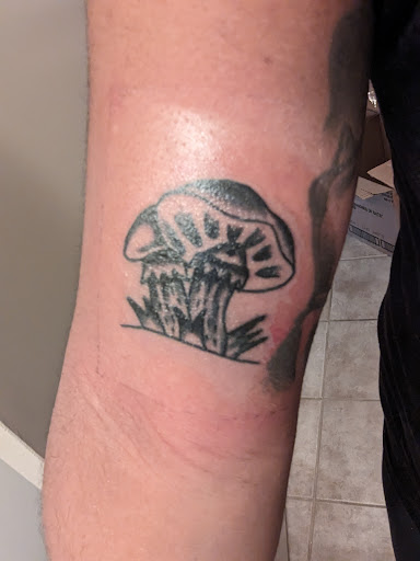 Explore blackout sleeve tattoo ideas, creative tattoo ideas in Marietta, available at Mystic Owl Tattoo