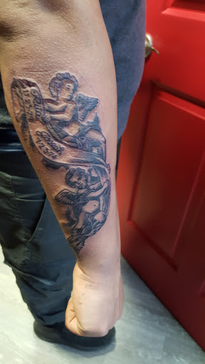 Explore gamble tattoo ideas, creative tattoo ideas in Cleveland, available at True Art Tattoos, Inc