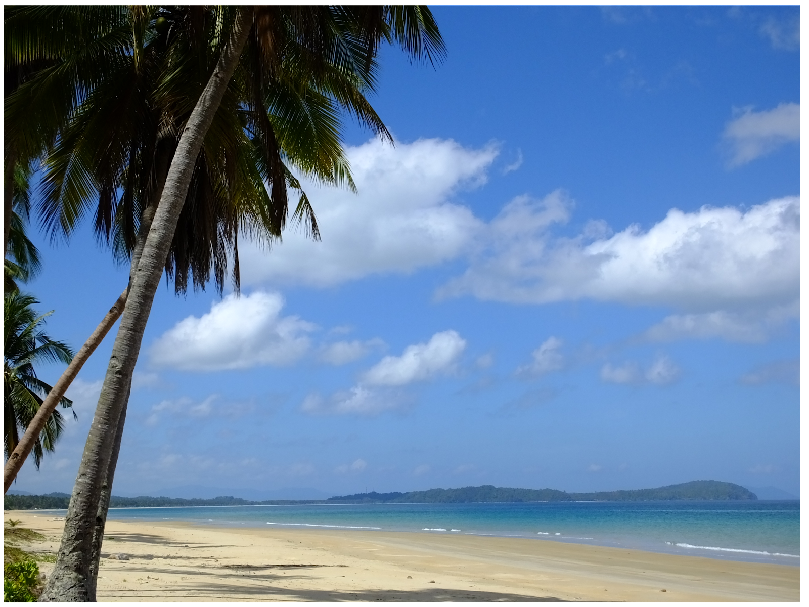 Fotografija Tagpis Beach z svetel fin pesek površino