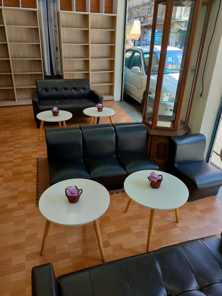 黑貓妞妞插畫創作複合茶飲 的照片