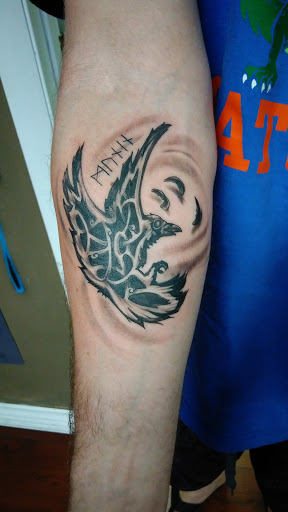 Explore fighter tattoo ideas, creative tattoo ideas in Pinellas Park, available at Lollis Studios Tattoo Company